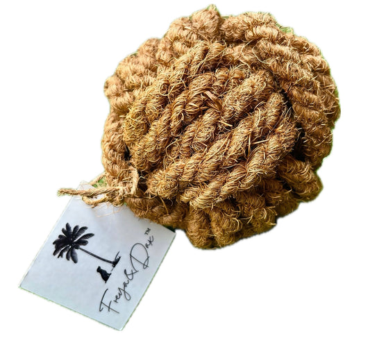 Large coconut husk dog chew ball made from 100% natural fibers. Biodegradable, plastic-free, and designed to support dental health during play. Safe, eco-friendly toy for medium to large dogs.